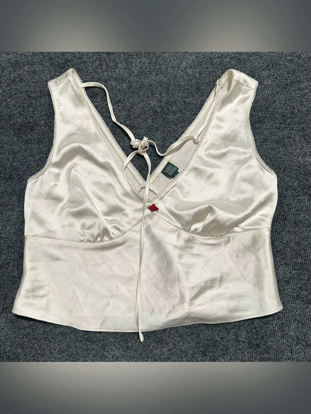 Wild fable White silk blouse with lace trim and red rose detail Size: Medium